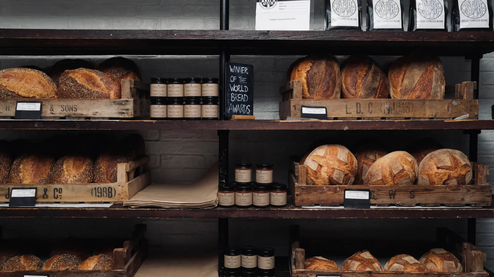 rustic shelves displaying sourdough bread from Stir Bakery Cambridge